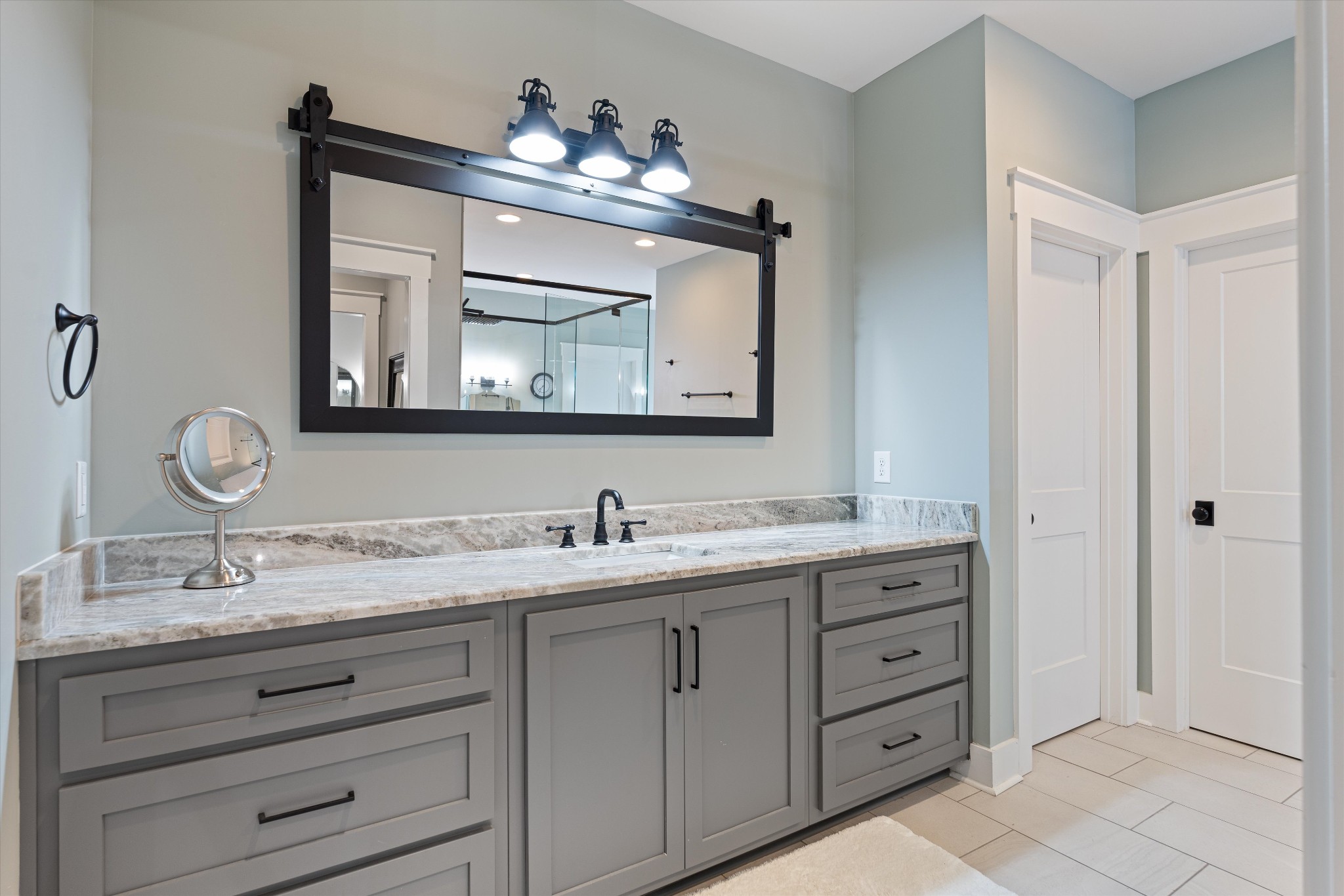 420 Fite Road Watertown, TN 37184 - Photo 52 of 76 a bathroom with a double vanity sink and a mirror