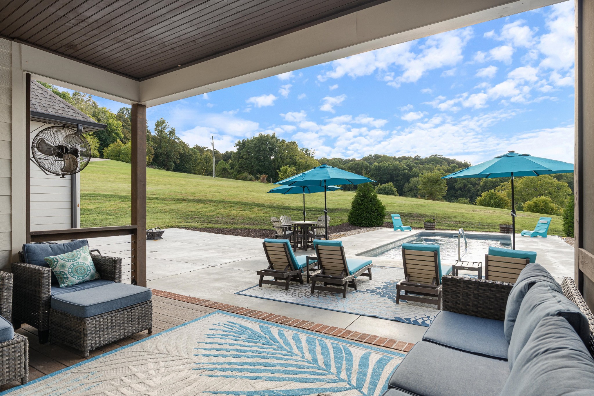 420 Fite Road Watertown, TN 37184 - Photo 64 of 76 a view of a patio with couches potted plants and a big yard
