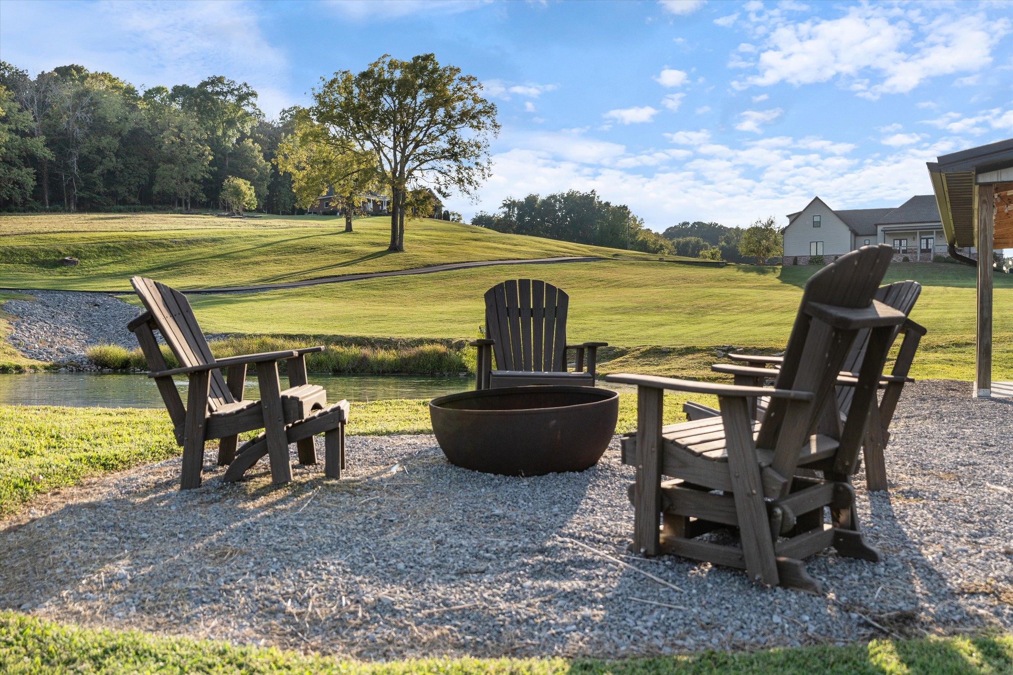 420 Fite Road Watertown, TN 37184 - Photo 70 of 76 a view of a lake with a table and chairs