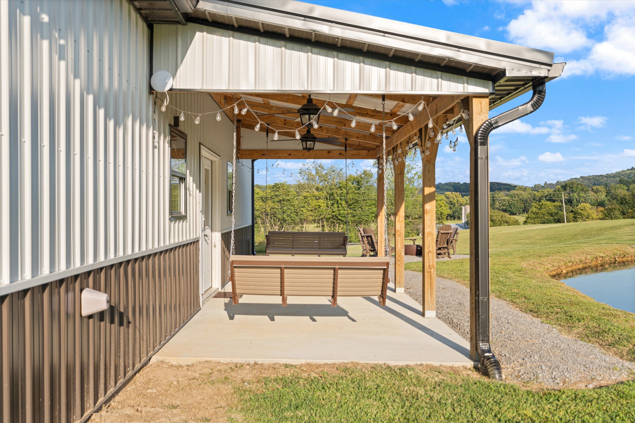 420 Fite Road Watertown, TN 37184 - Photo 72 of 76 a view of a porch with a table and chairs