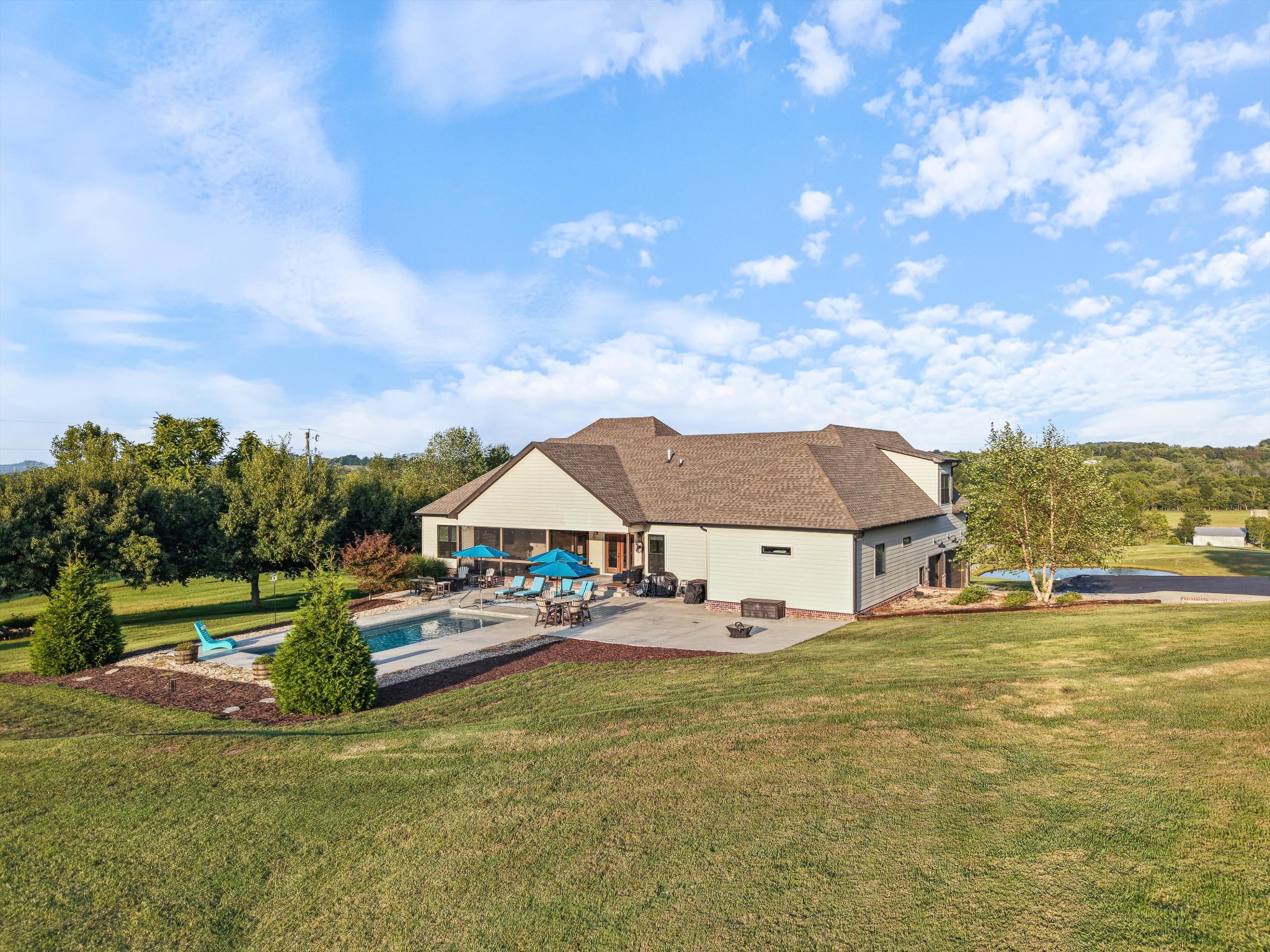 420 Fite Road Watertown, TN 37184 - Photo 9 of 76 a view of a house with pool and chairs