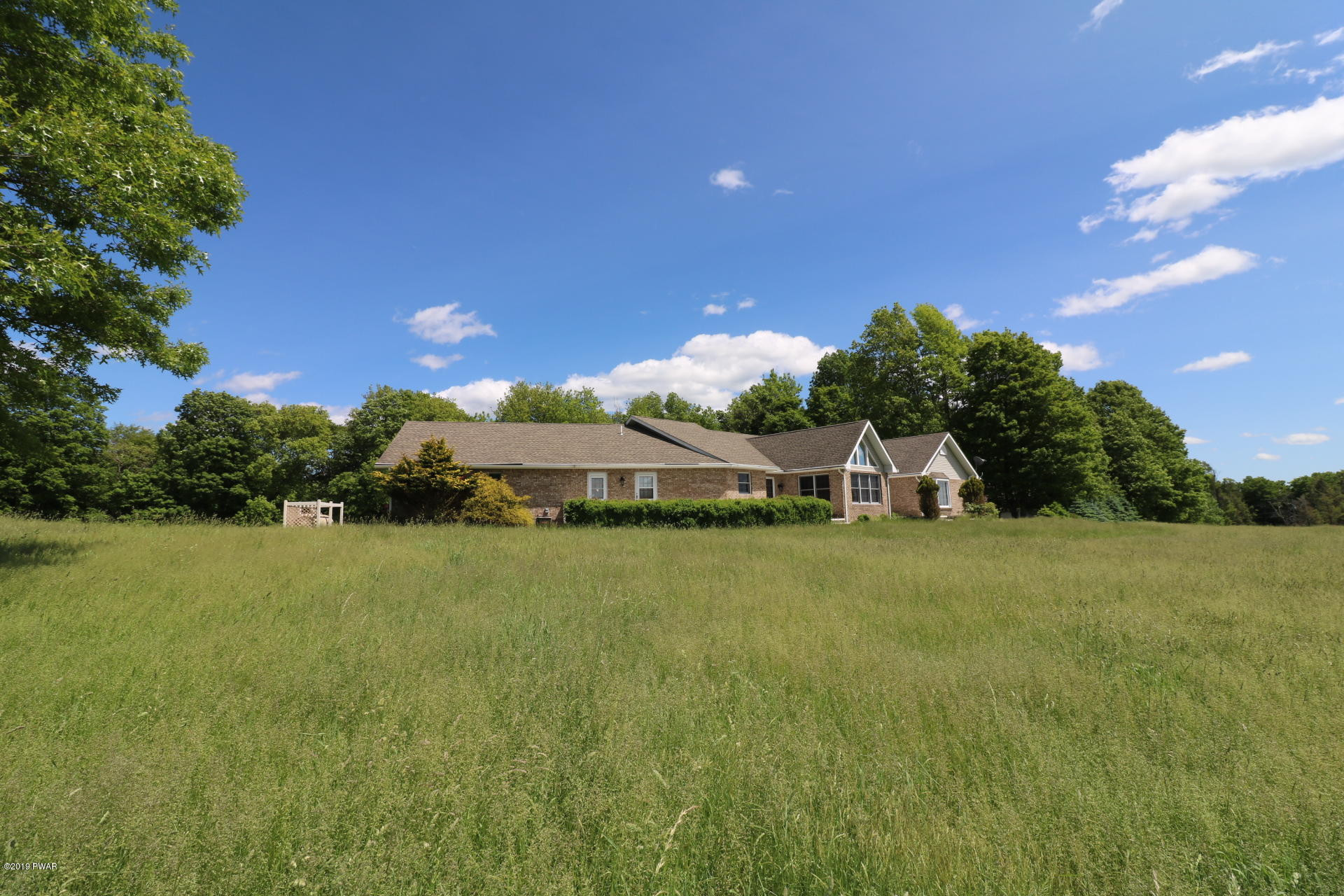 53 Savitz Road Lake Ariel, PA 18436 - Photo 11 of 53 a front view of a house with a garden