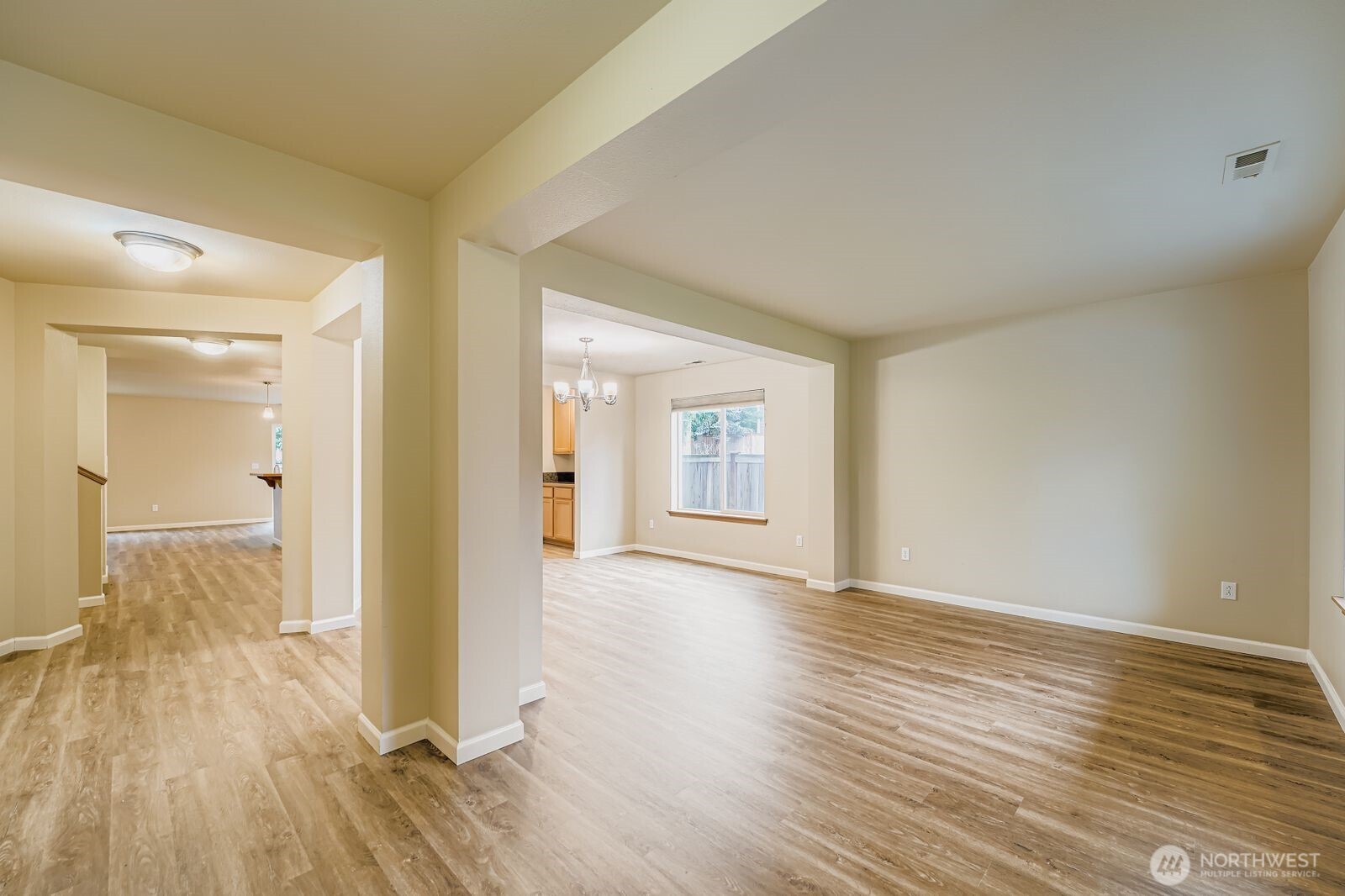 27030 228th Place Southeast Maple Valley, WA 98038 - Photo 13 of 36 a view of a room with wooden floor and a bathroom