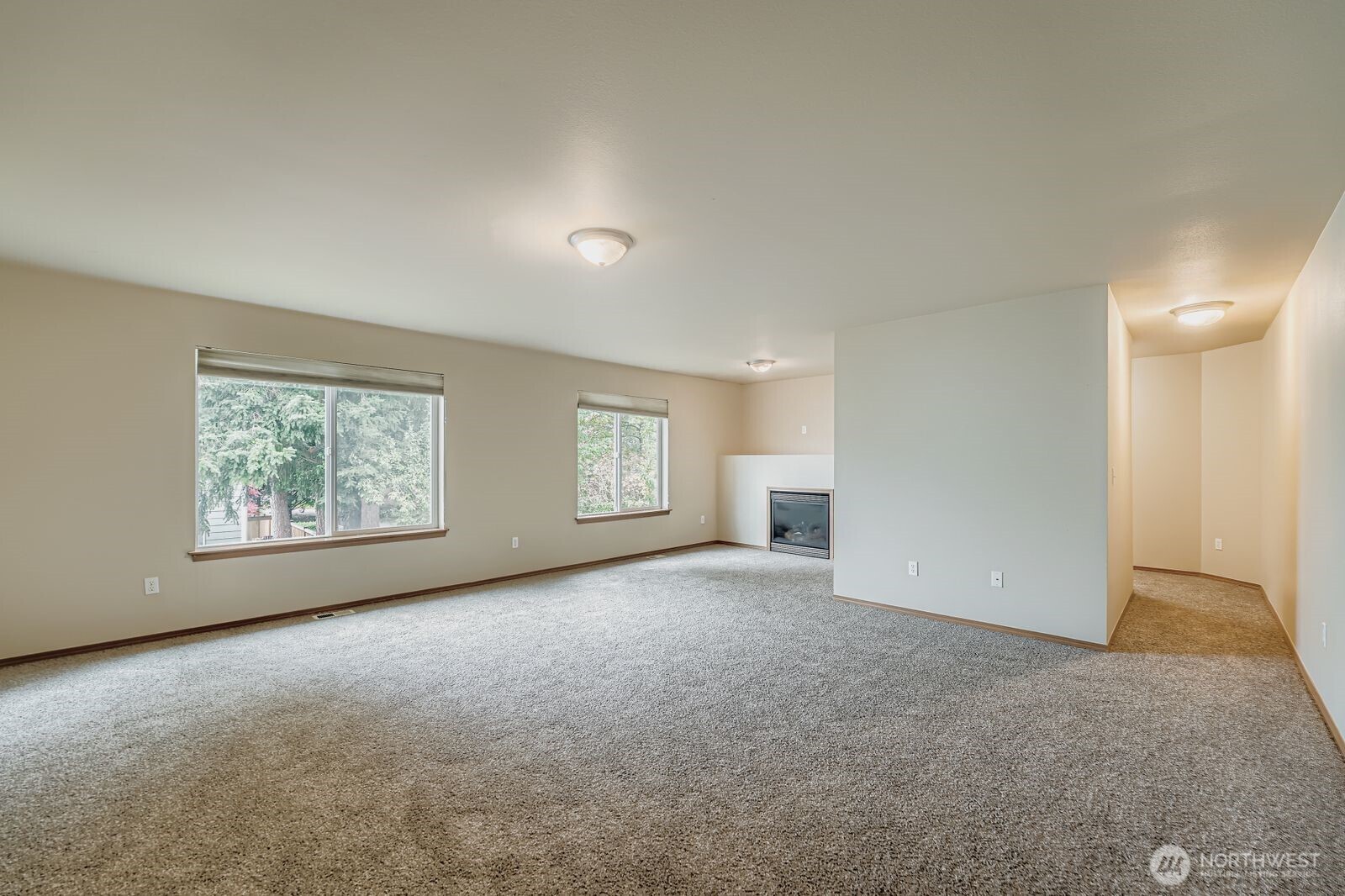 27030 228th Place Southeast Maple Valley, WA 98038 - Photo 18 of 36 an empty room with windows and closet