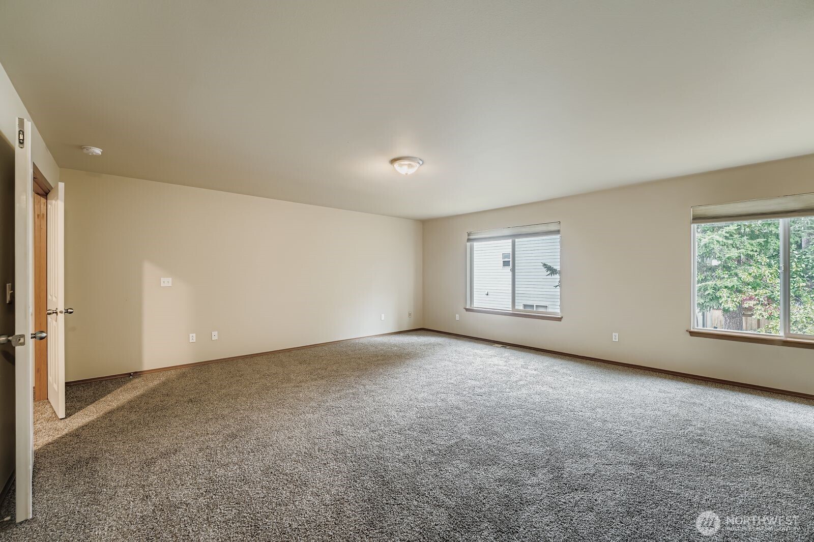 27030 228th Place Southeast Maple Valley, WA 98038 - Photo 20 of 36 an empty room with windows and closet