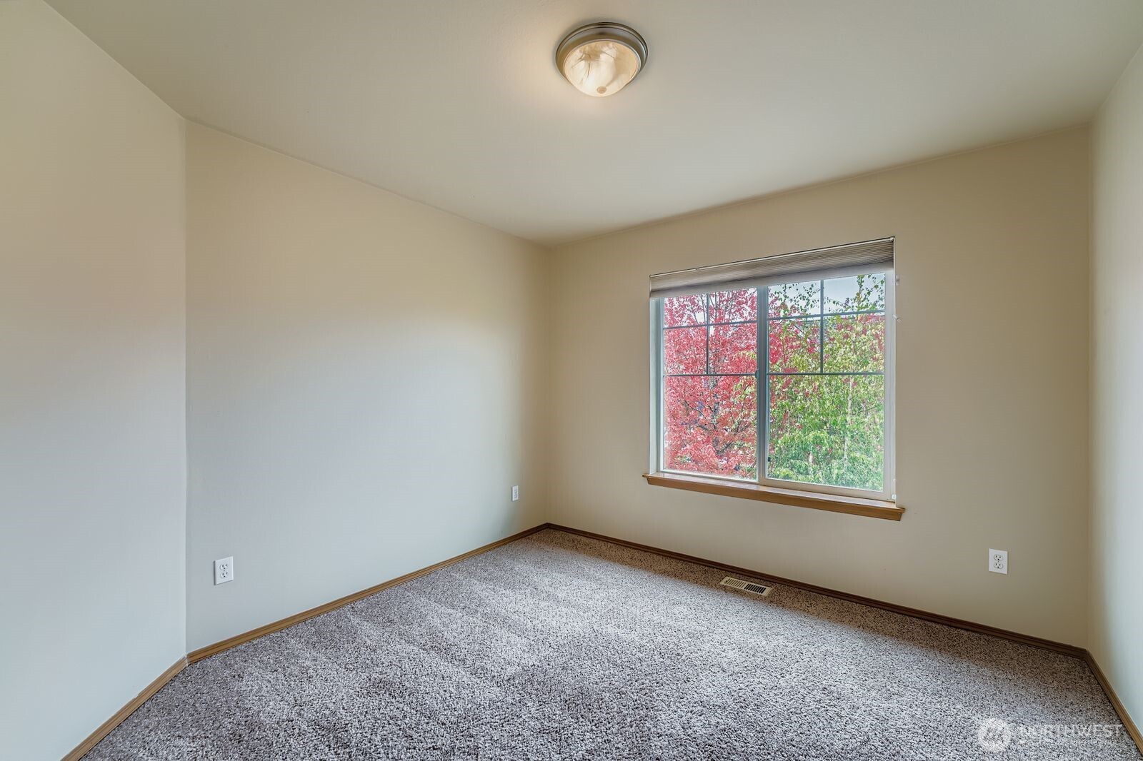 27030 228th Place Southeast Maple Valley, WA 98038 - Photo 24 of 36 an empty room with a window