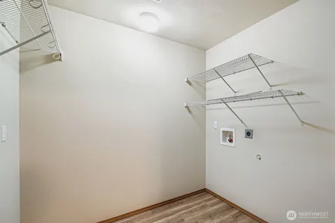 a view of a room with racks on the wall