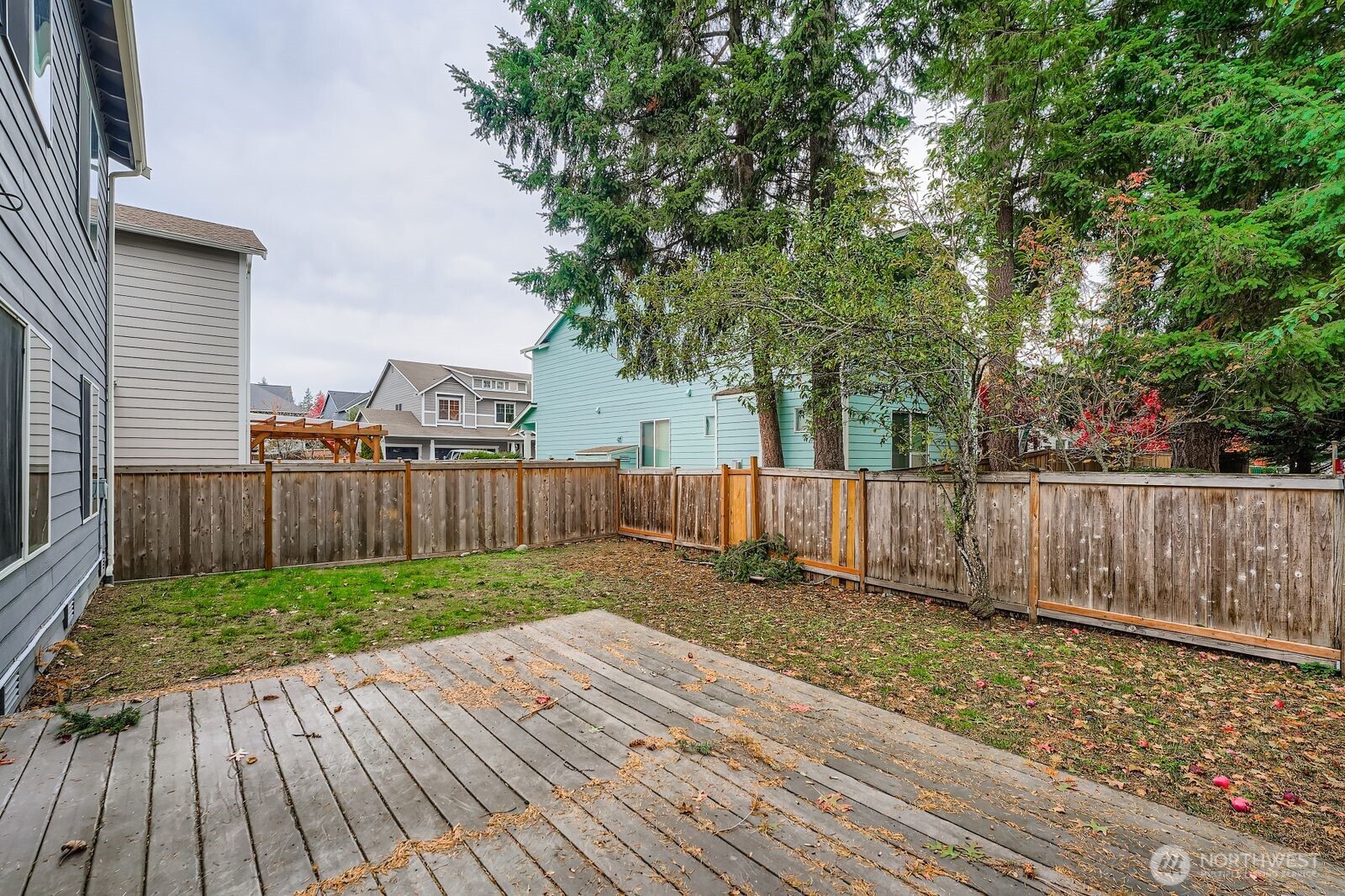 27030 228th Place Southeast Maple Valley, WA 98038 - Photo 31 of 36 a view of backyard with wooden fence