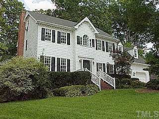 7916 Sutcliffe Drive Raleigh, NC 27613 - Photo 1 of 1 a house that has a lot of windows in it