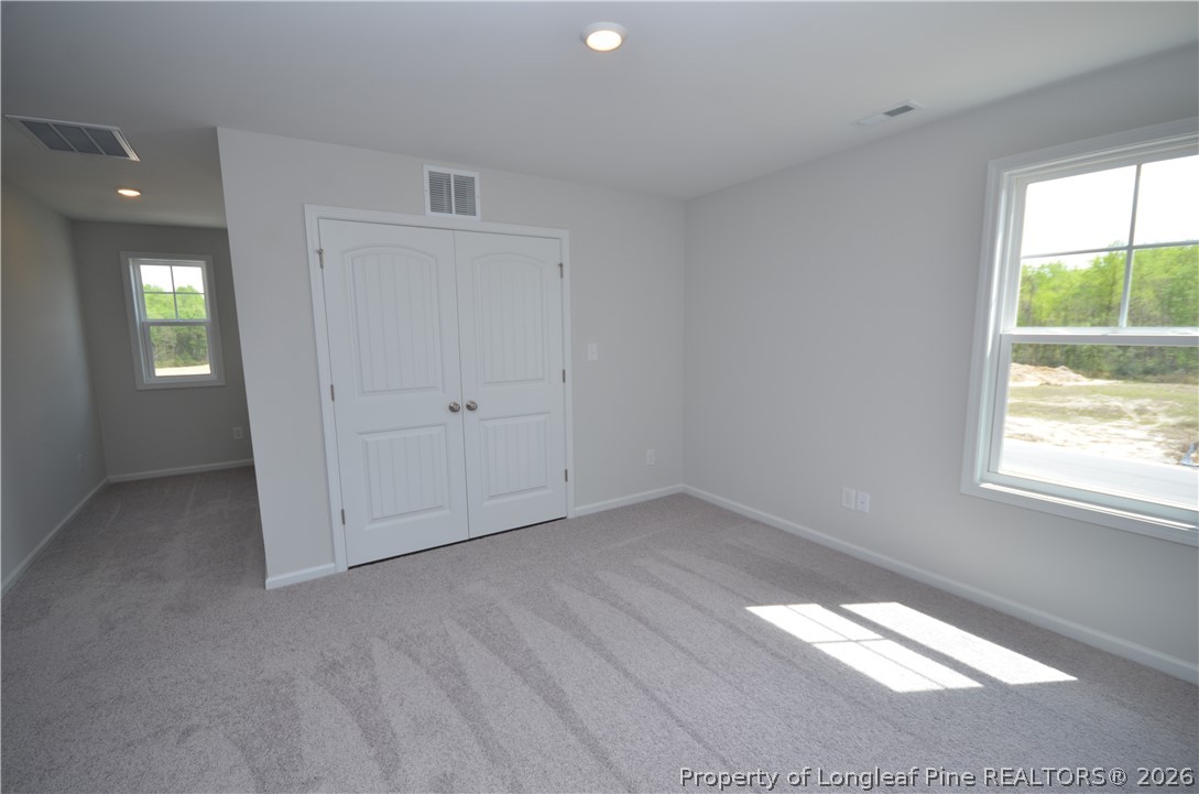 5405 Short Leaf Road Fayetteville, NC 28311 - Photo 13 of 29 a view of empty room with window