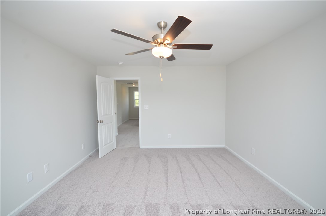 5405 Short Leaf Road Fayetteville, NC 28311 - Photo 17 of 29 a view of empty room with wooden floor