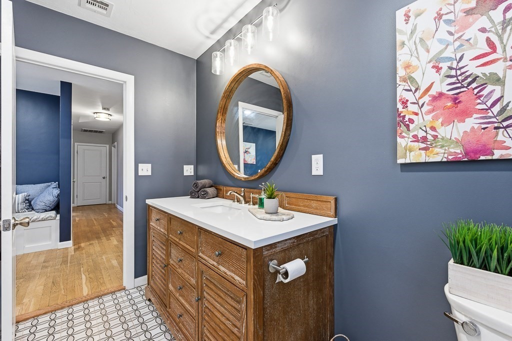 26 Prospect Street Blackstone, MA 01504 - Photo 14 of 41 a bathroom with a sink and a mirror