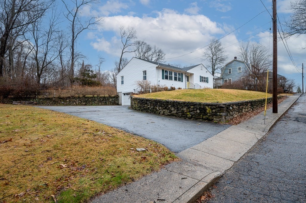 26 Prospect Street Blackstone, MA 01504 - Photo 2 of 41 a large pool is sitting in the middle of a yard