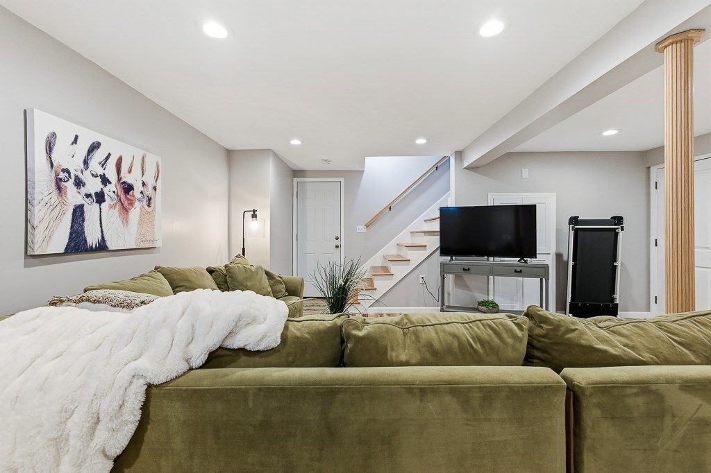 26 Prospect Street Blackstone, MA 01504 - Photo 29 of 41 a living room with furniture and a flat screen tv