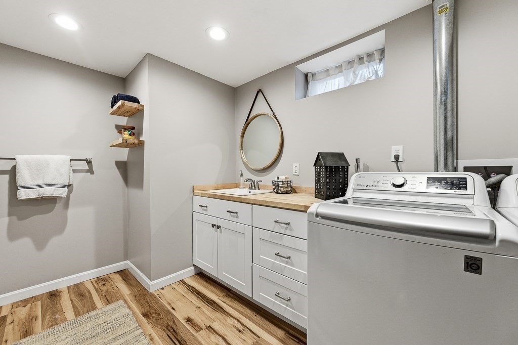 26 Prospect Street Blackstone, MA 01504 - Photo 32 of 41 a bathroom with a sink and a mirror