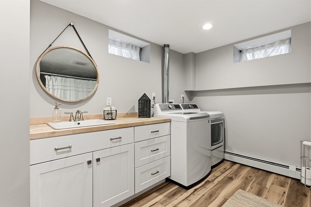 26 Prospect Street Blackstone, MA 01504 - Photo 33 of 41 a bathroom with a sink and a mirror
