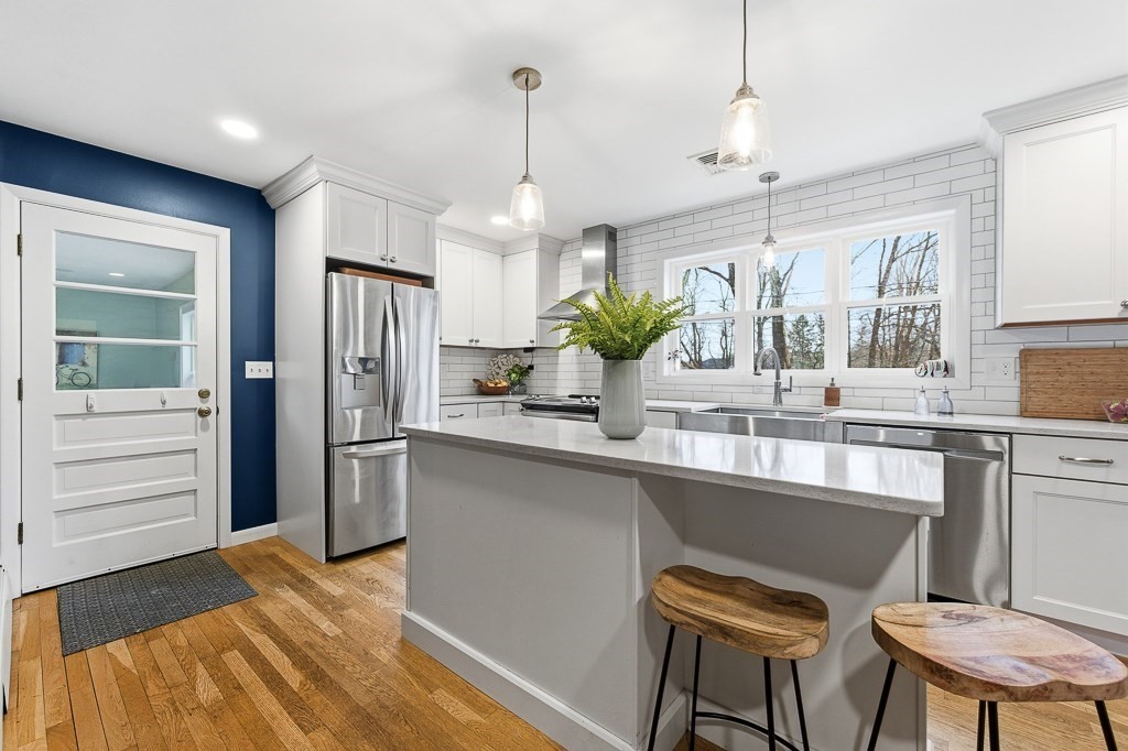 26 Prospect Street Blackstone, MA 01504 - Photo 5 of 41 a kitchen with stainless steel appliances a sink and a refrigerator