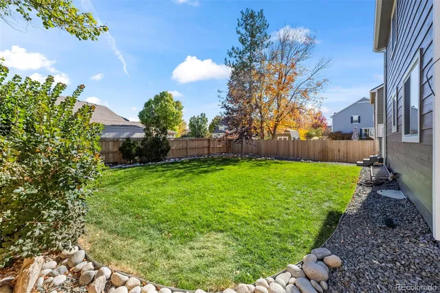 a view of a backyard with a garden