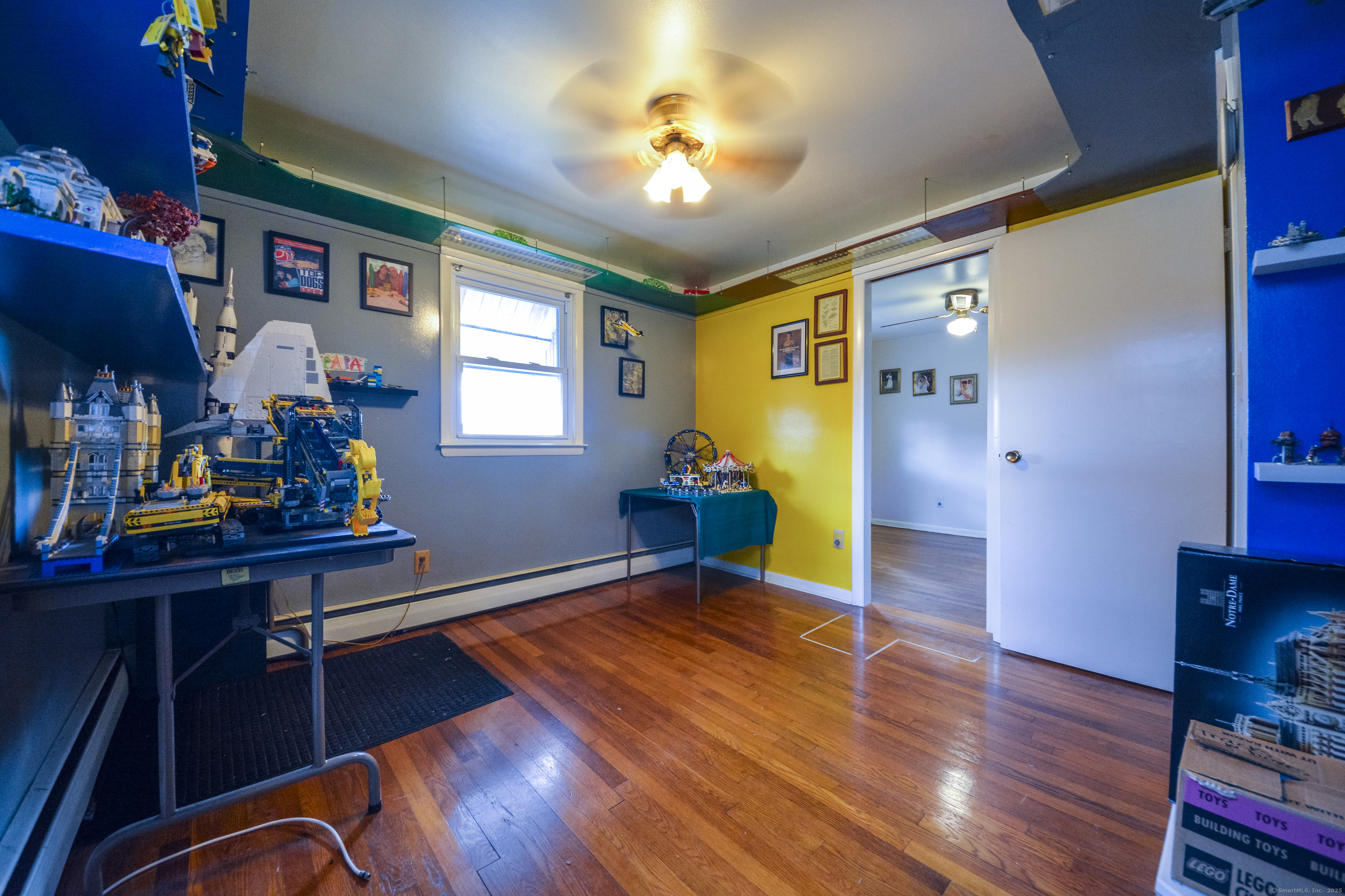 291 Frenchtown Road Bridgeport, CT 06606 - Photo 23 of 40 a living room with furniture and a wooden floor