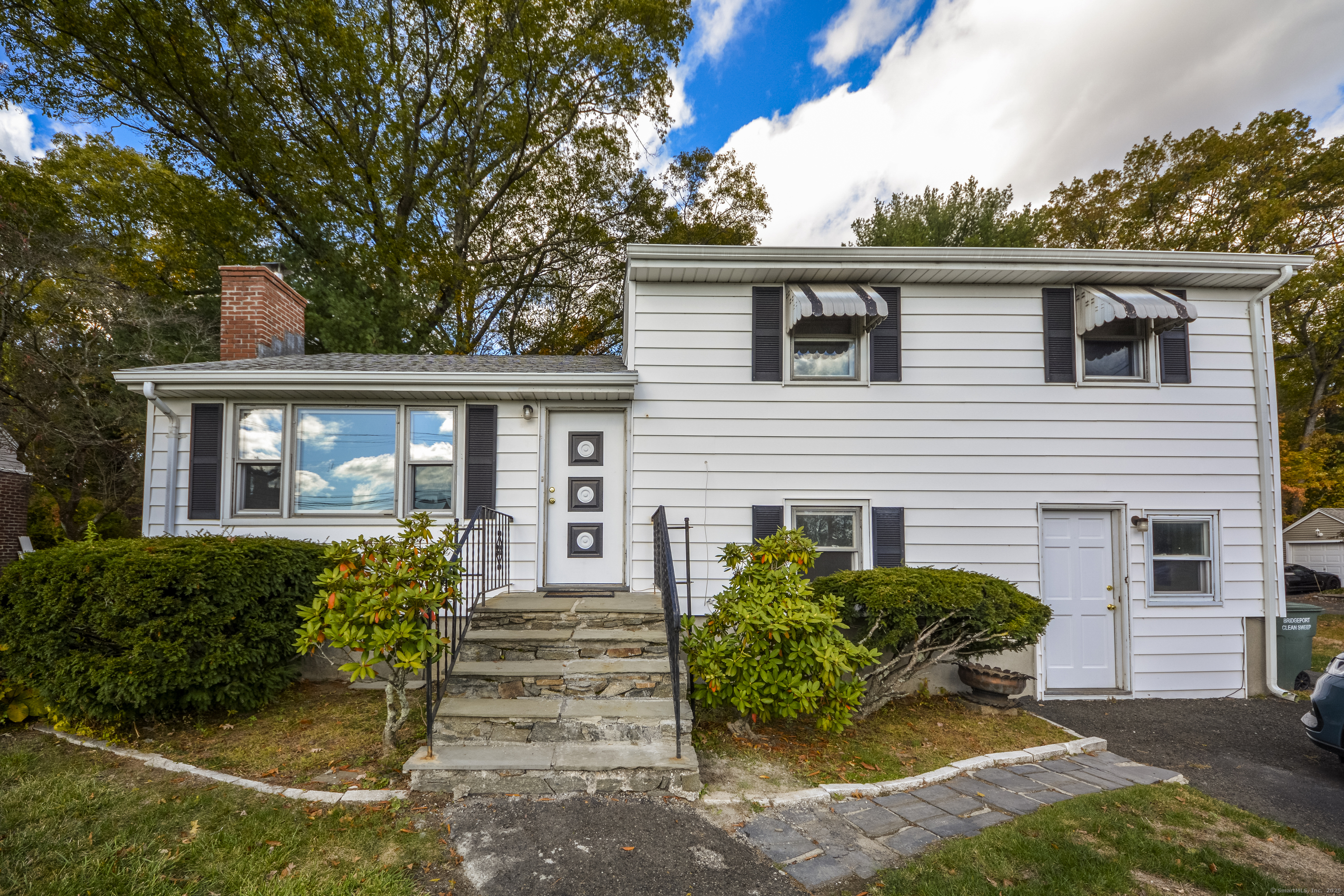 291 Frenchtown Road Bridgeport, CT 06606 - Photo 6 of 40 front view of a house with a yard