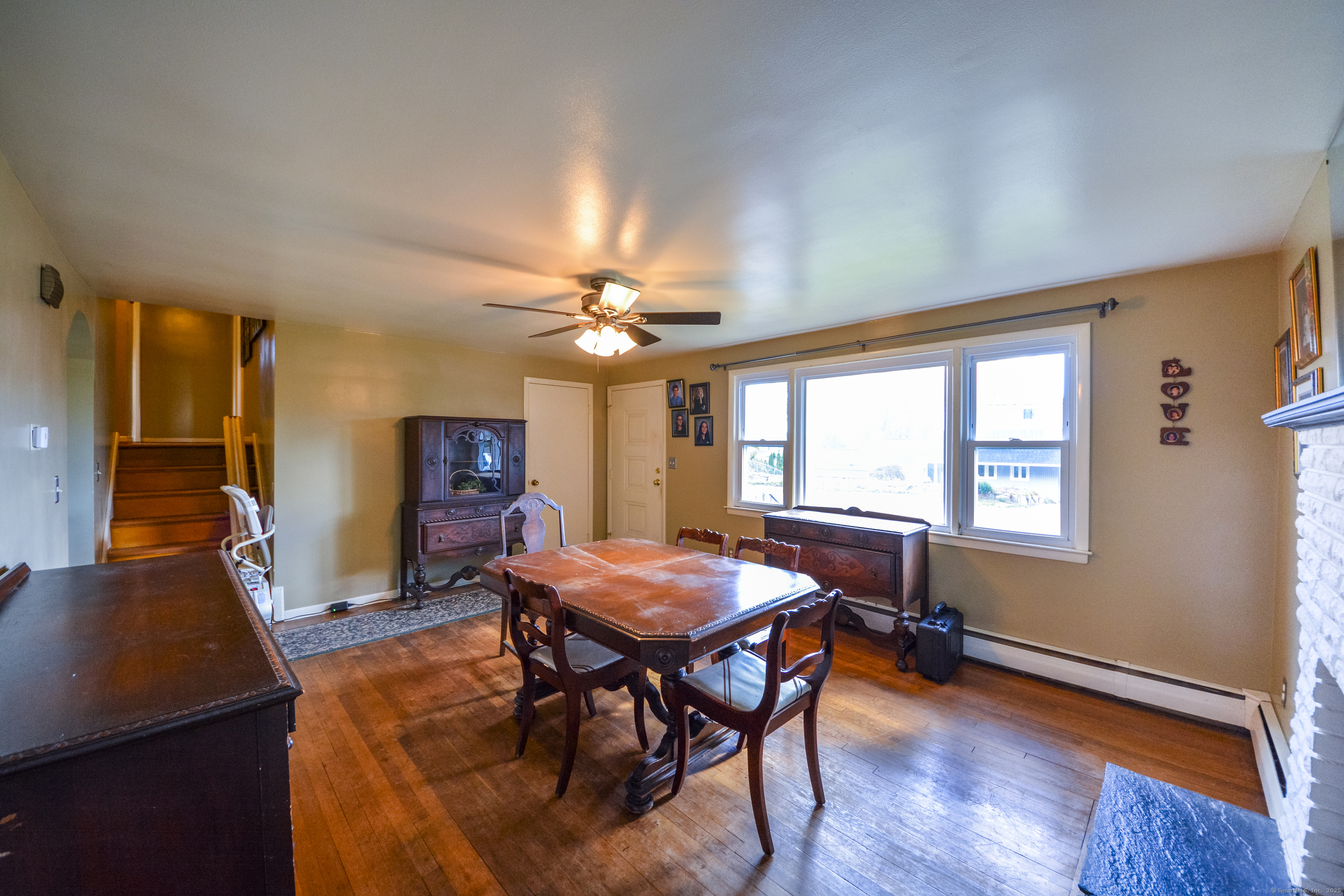 291 Frenchtown Road Bridgeport, CT 06606 - Photo 8 of 40 a view of a dining room with furniture window and wooden floor