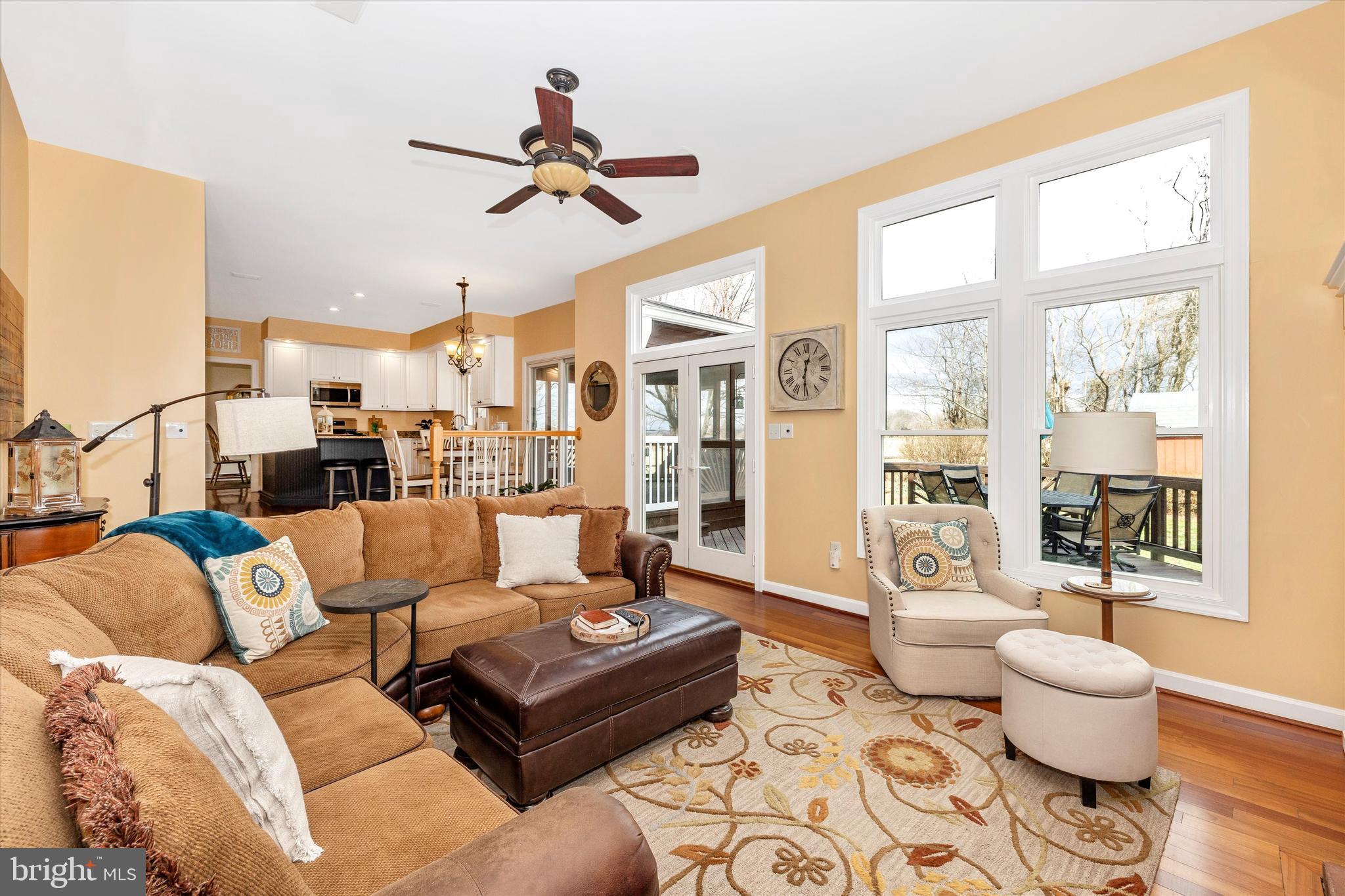 17918 Hickman Street Poolesville, MD 20837 - Photo 20 of 96 a living room with furniture and a large window