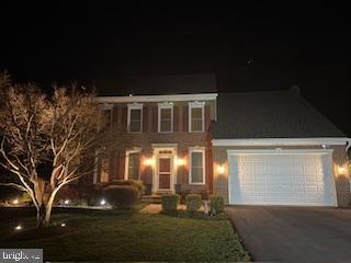 17918 Hickman Street Poolesville, MD 20837 - Photo 2 of 96 a front view of a house with yard