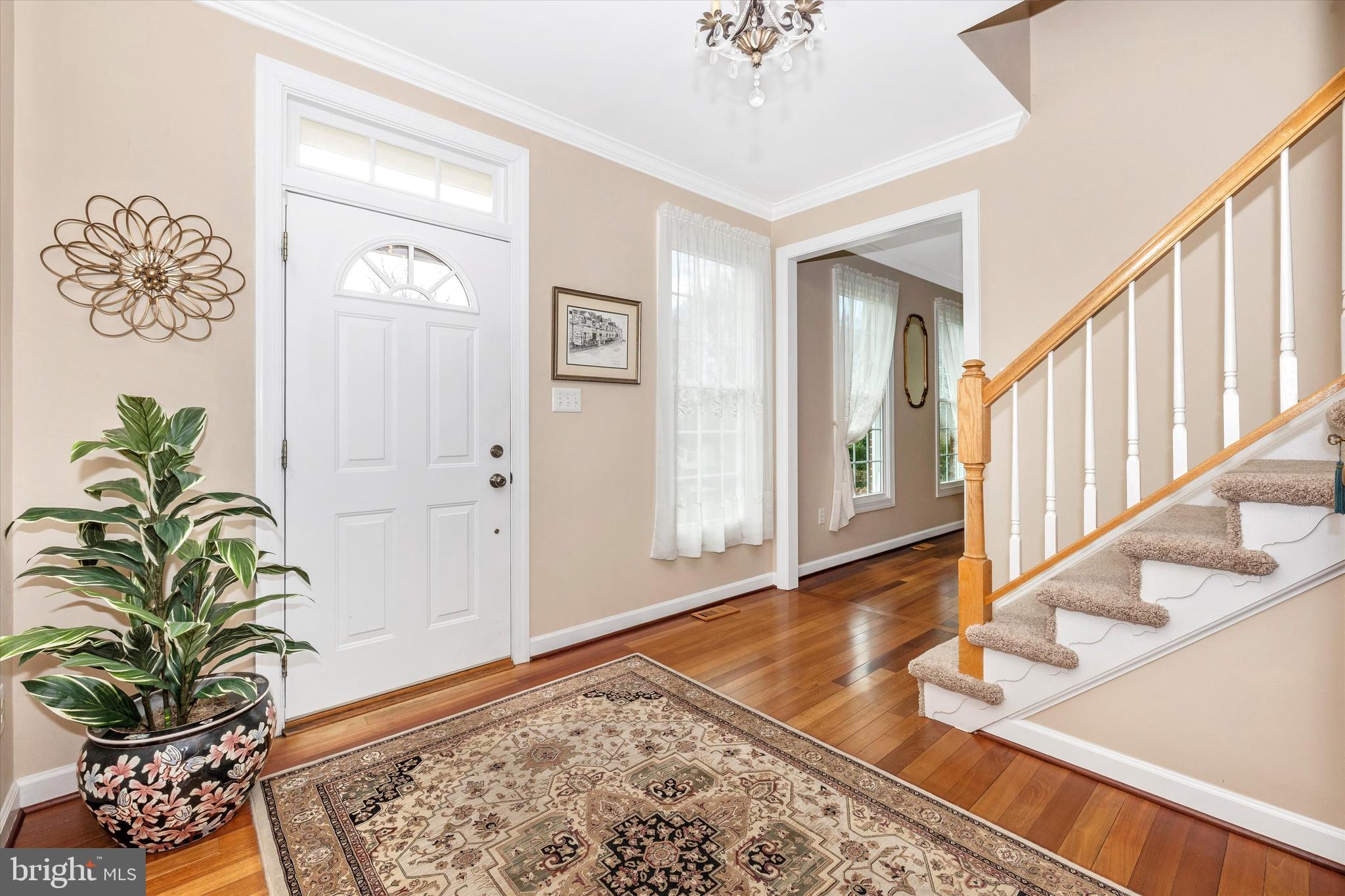 17918 Hickman Street Poolesville, MD 20837 - Photo 3 of 96 a view of an entryway with wooden floor