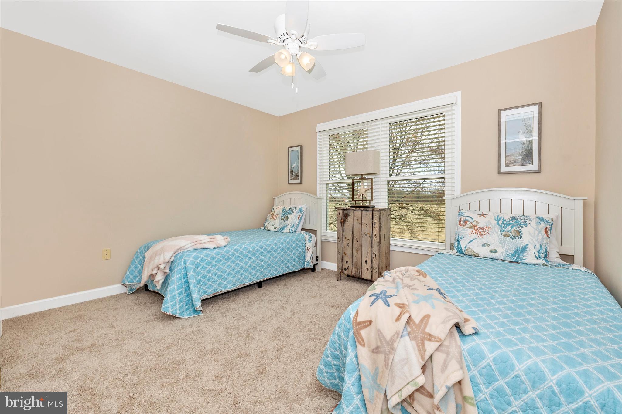 17918 Hickman Street Poolesville, MD 20837 - Photo 37 of 96 a bedroom with a bed dresser and a window