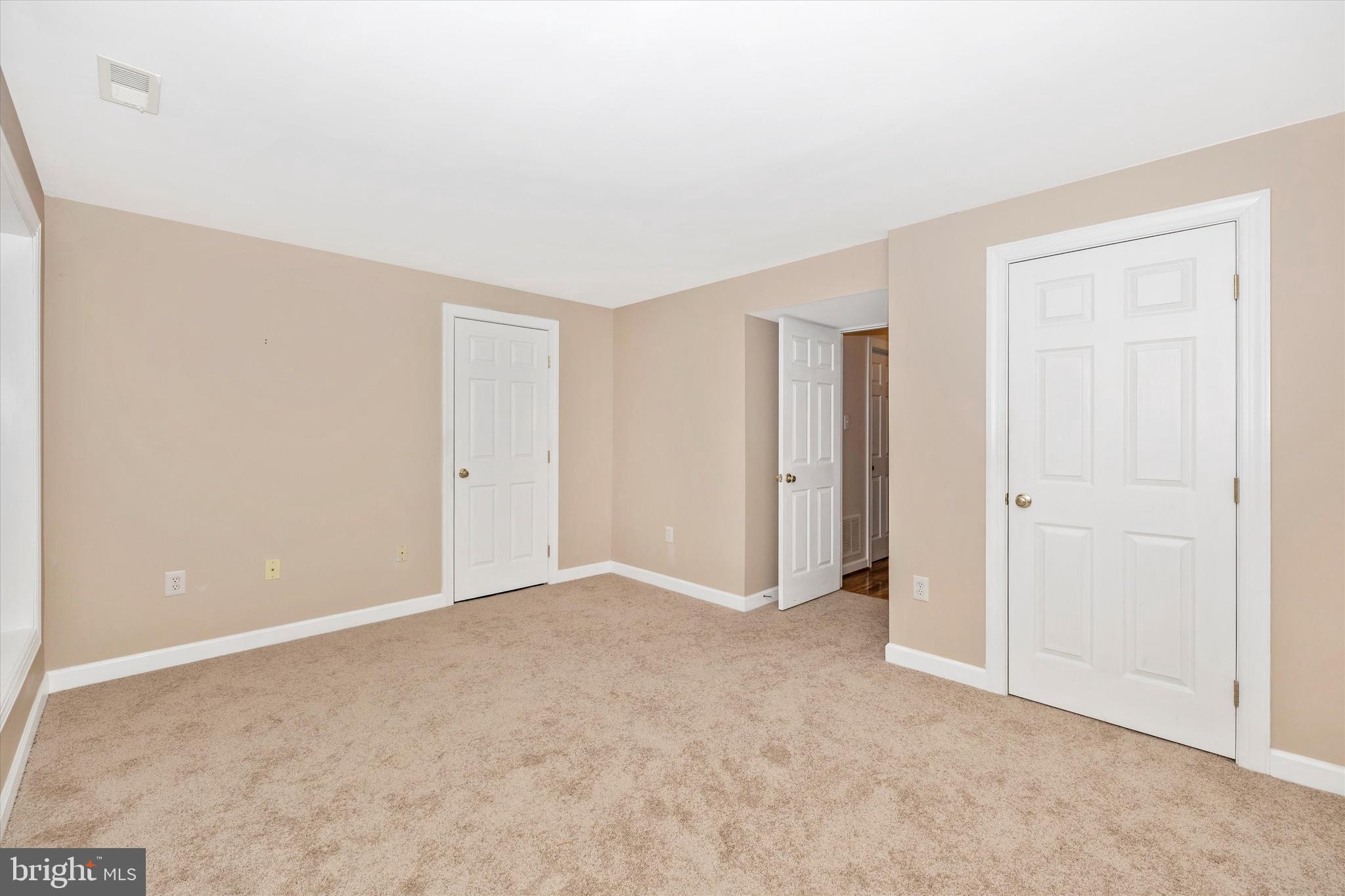 17918 Hickman Street Poolesville, MD 20837 - Photo 46 of 96 a view of an empty room with closet area