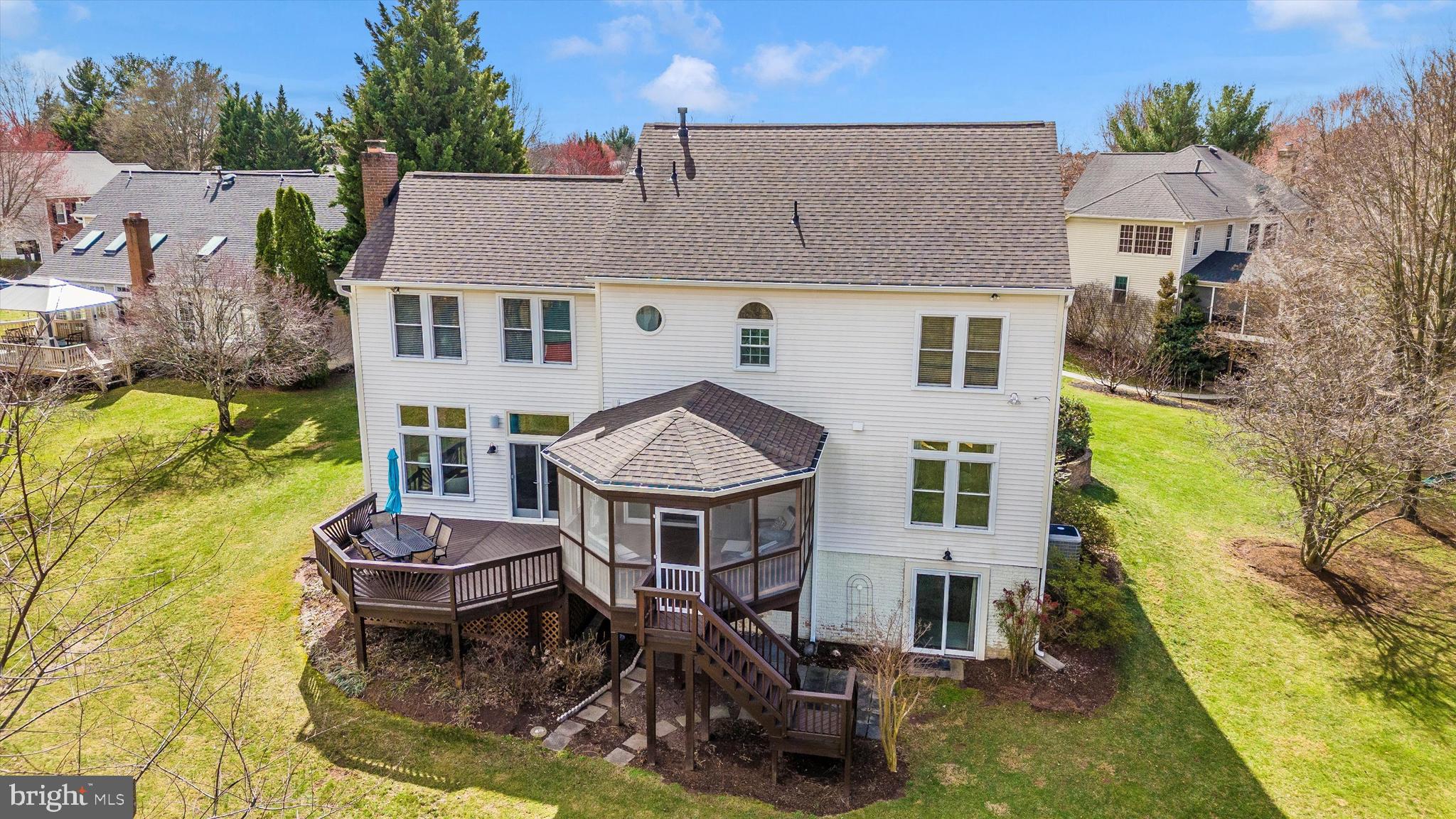 17918 Hickman Street Poolesville, MD 20837 - Photo 50 of 96 a aerial view of a house with swimming pool and patio