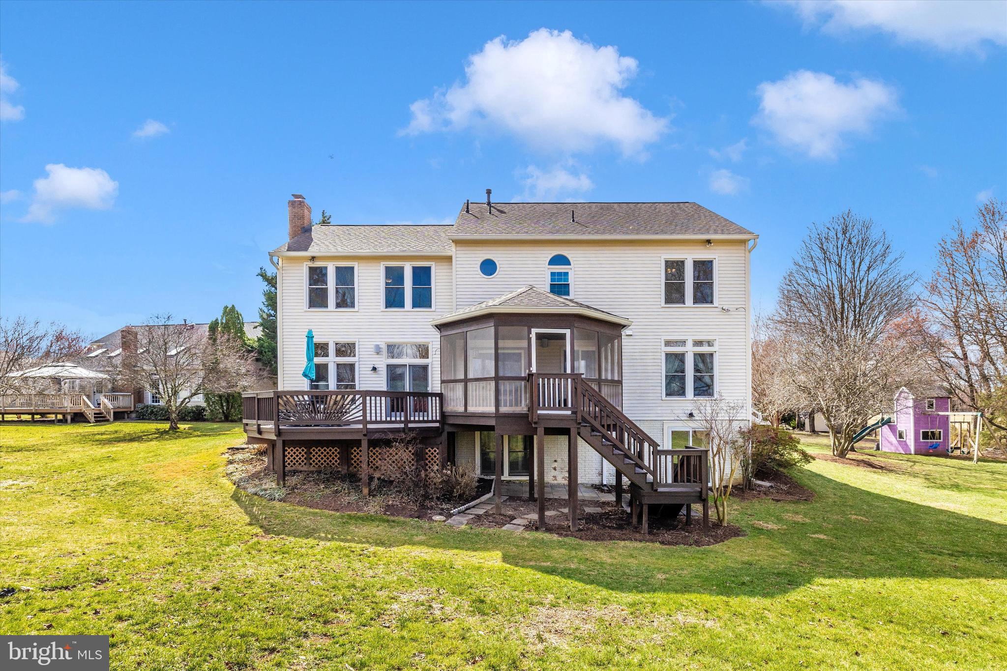 17918 Hickman Street Poolesville, MD 20837 - Photo 51 of 96 a view of a house with swimming pool and a yard