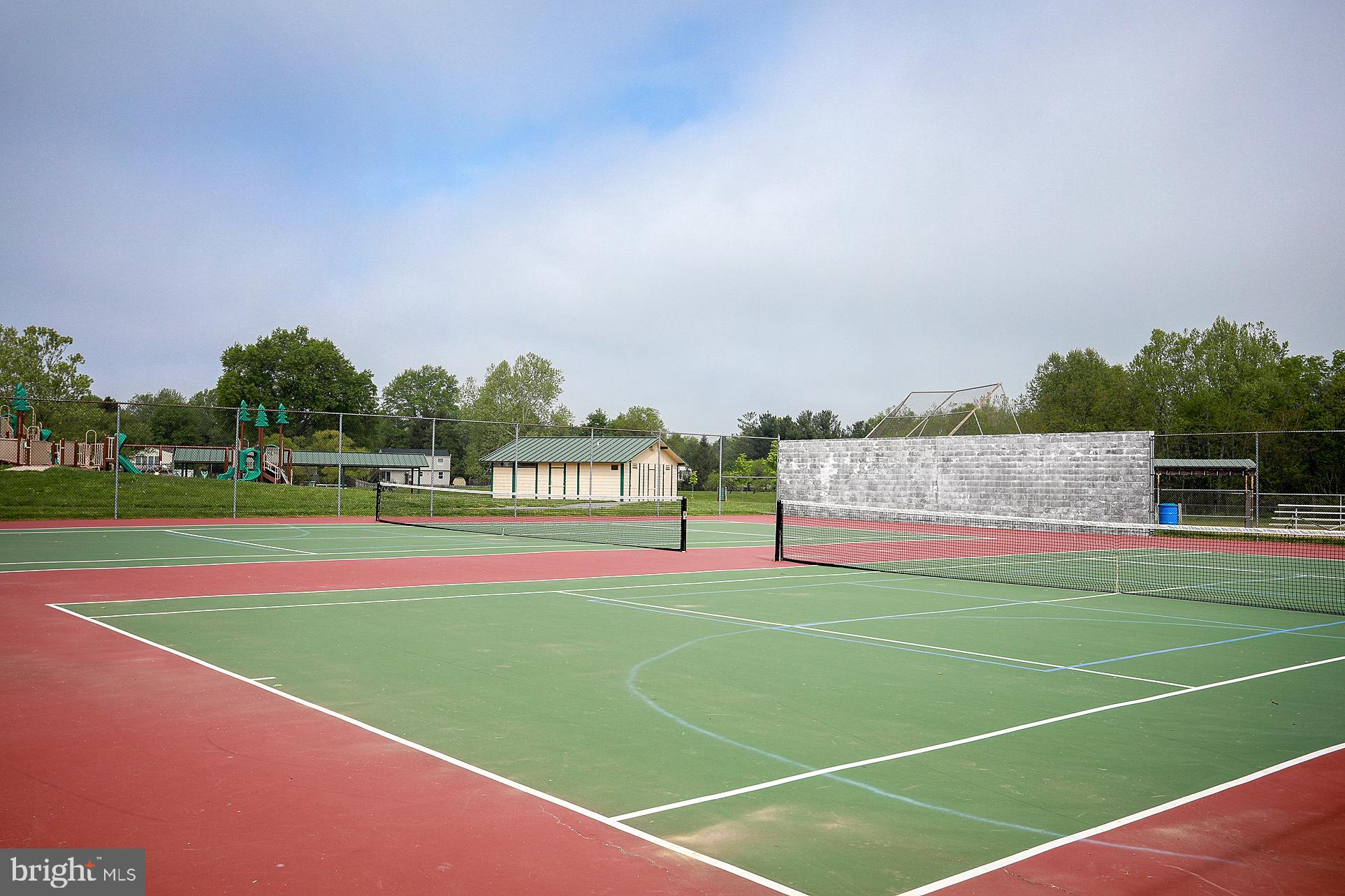 17918 Hickman Street Poolesville, MD 20837 - Photo 86 of 96 a view of an outdoor space and tennis court