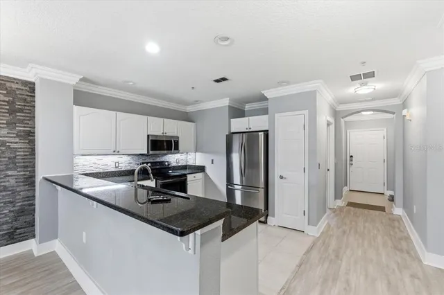 $399,000 | 100 Canopy Walk Lane, Unit 112, Palm Coast, FL 32137