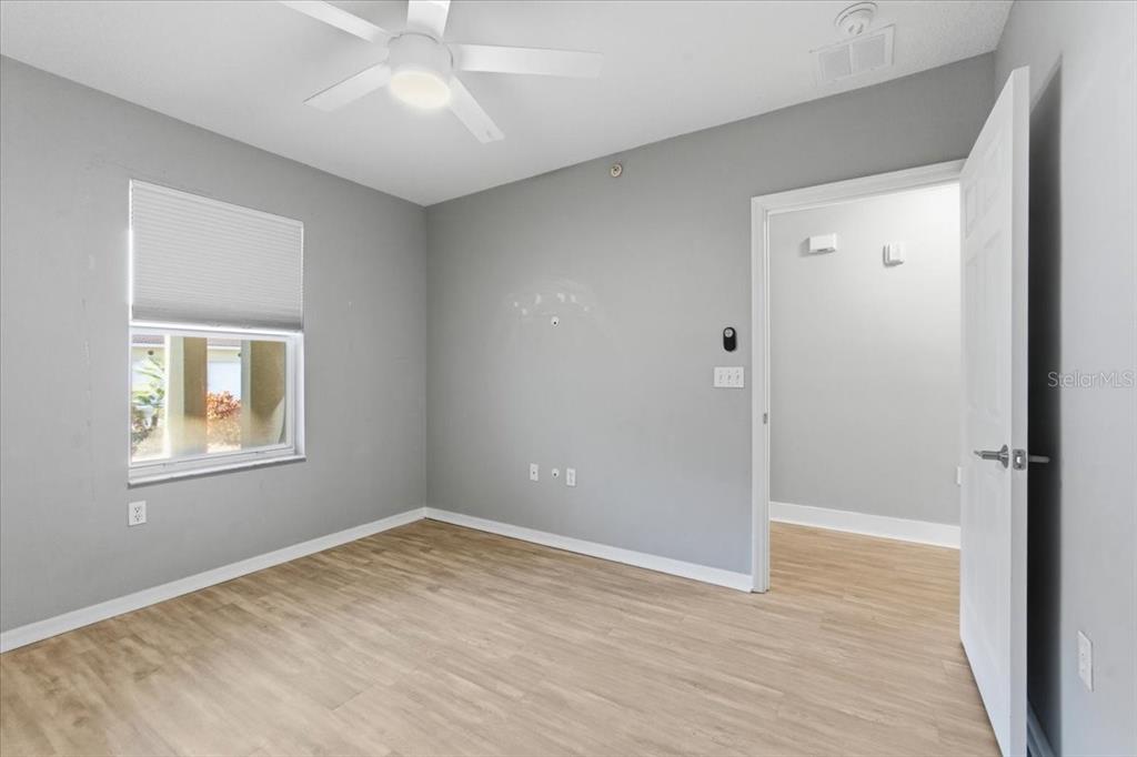 100 Canopy Walk Lane, Unit 112 Palm Coast, FL 32137 - Photo 26 of 62 an empty room with windows and closet