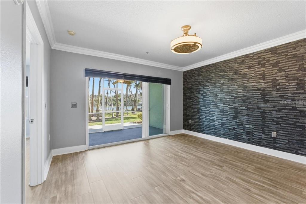 100 Canopy Walk Lane, Unit 112 Palm Coast, FL 32137 - Photo 4 of 62 a view of an empty room with a window