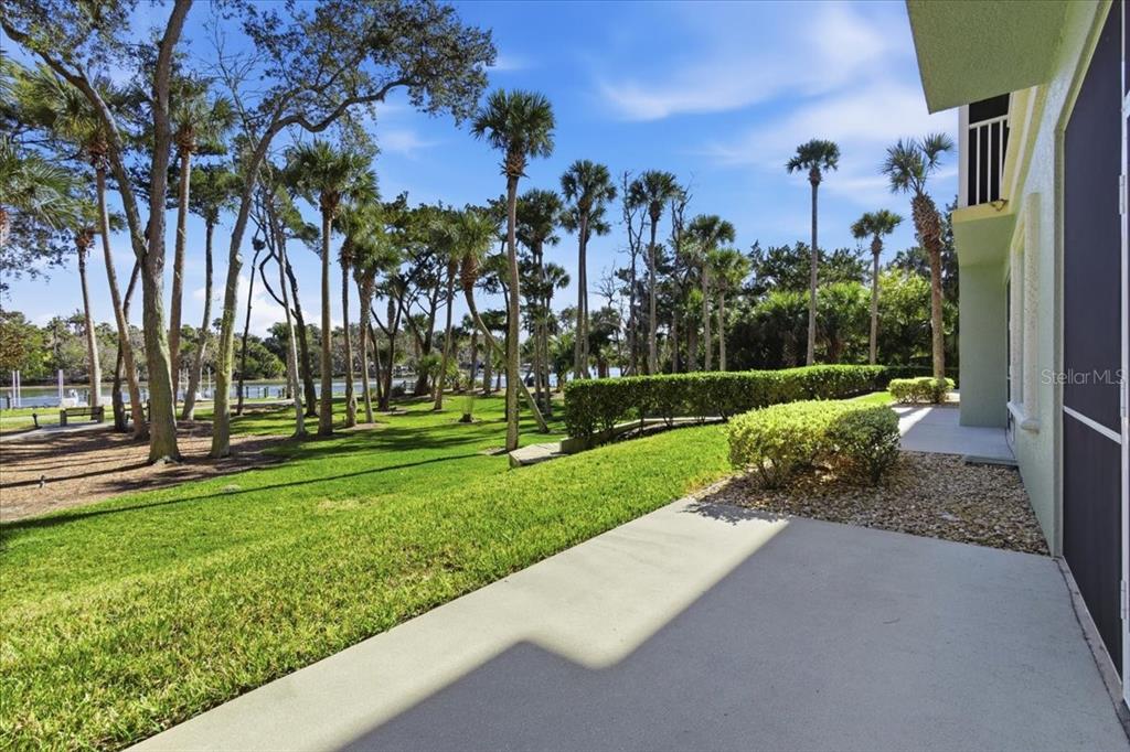 100 Canopy Walk Lane, Unit 112 Palm Coast, FL 32137 - Photo 57 of 62 a view of a park with palm trees