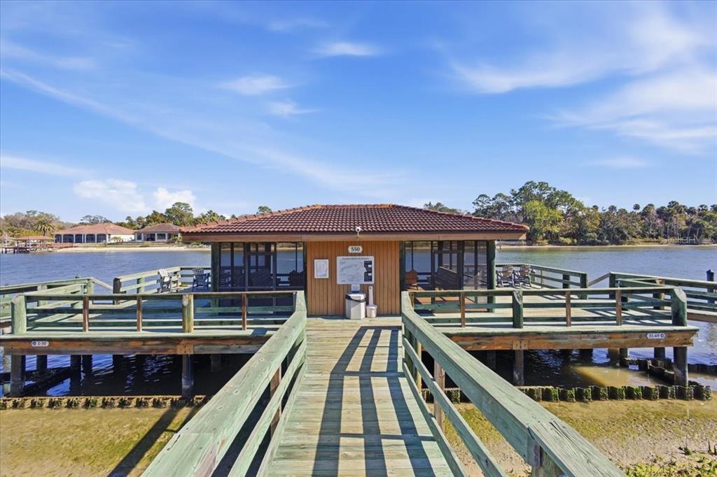 100 Canopy Walk Lane, Unit 112 Palm Coast, FL 32137 - Photo 61 of 62 a view of a balcony with wooden floor and city view