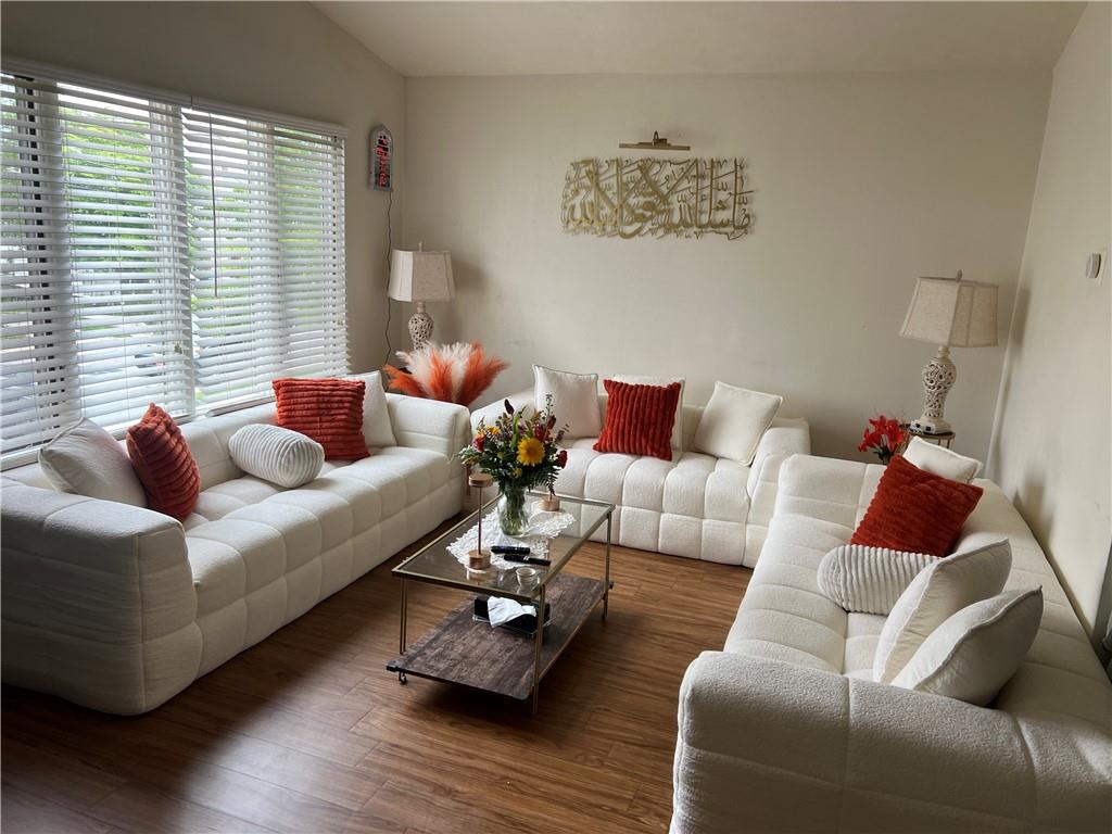 309 Magazine Street Carnegie, PA 15106 - Photo 2 of 18 a living room with furniture and a couch