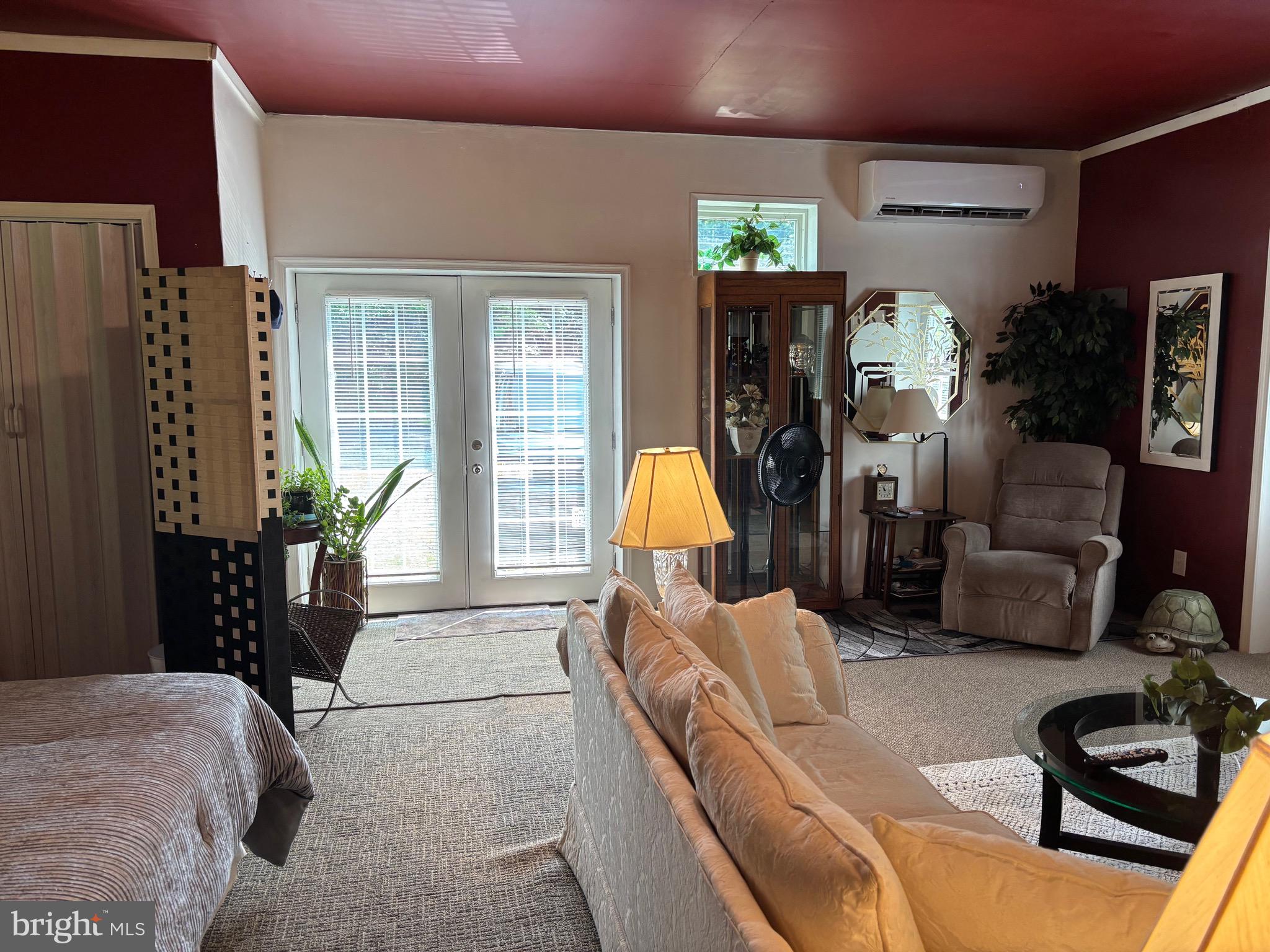 579 Leeland Road Fredericksburg, VA 22405 - Photo 13 of 20 a living room with furniture and a lamp
