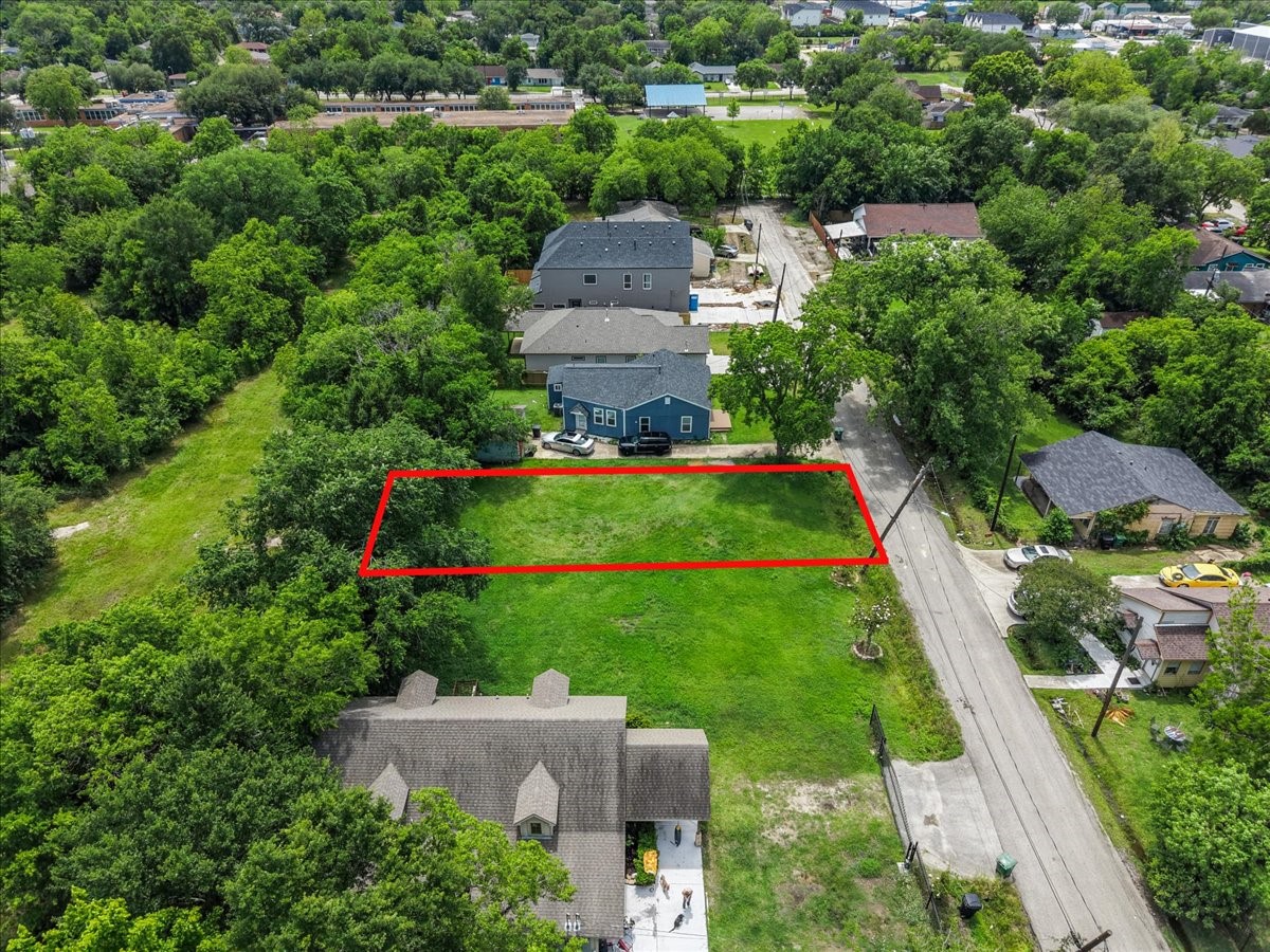 0 Grace Lane Houston, TX 77021 - Photo 27 of 27 an aerial view of a house with a yard and lake view