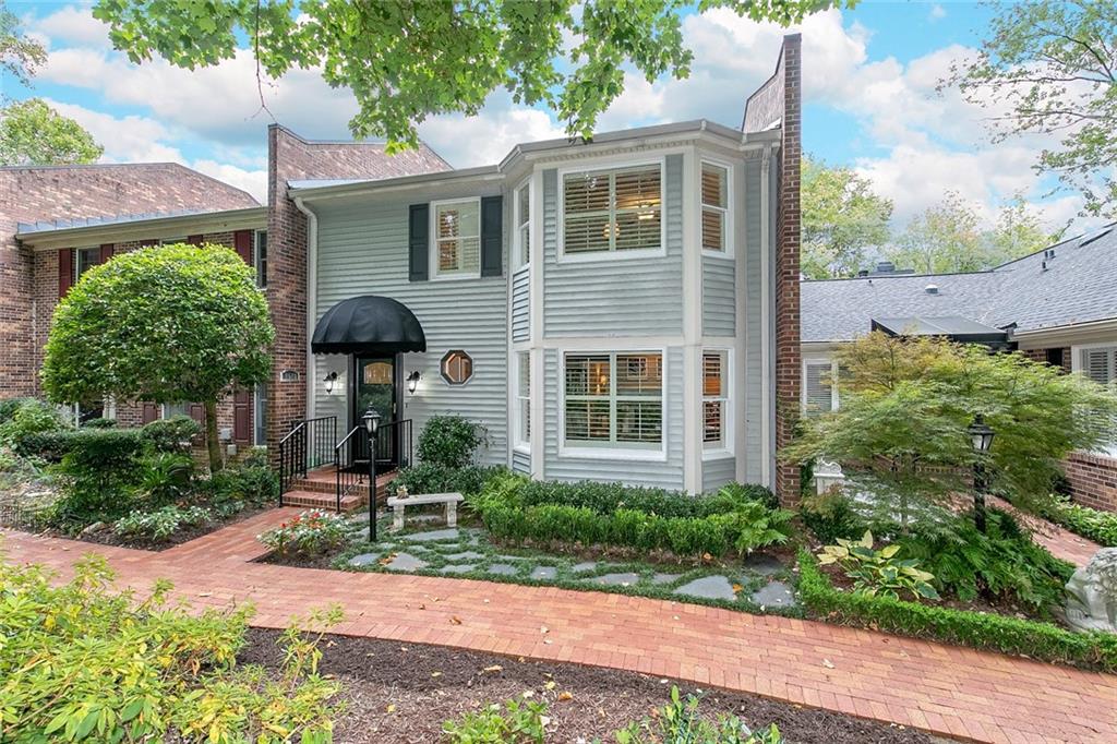1508 September Chase Decatur, GA 30033 - Photo 1 of 1 a front view of a house with garden