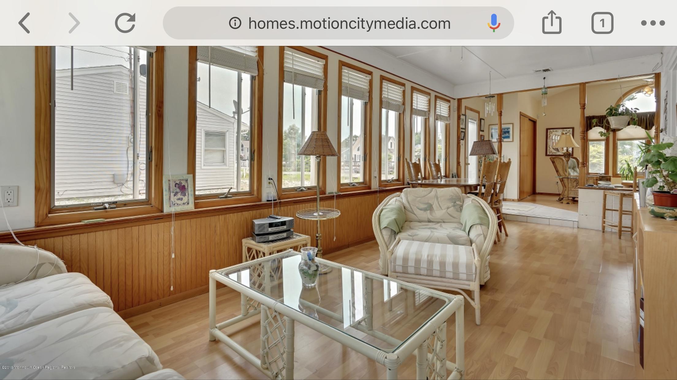 40 Cedar Run Road Bayville, NJ 08721 - Photo 6 of 12 a living room with furniture and large windows