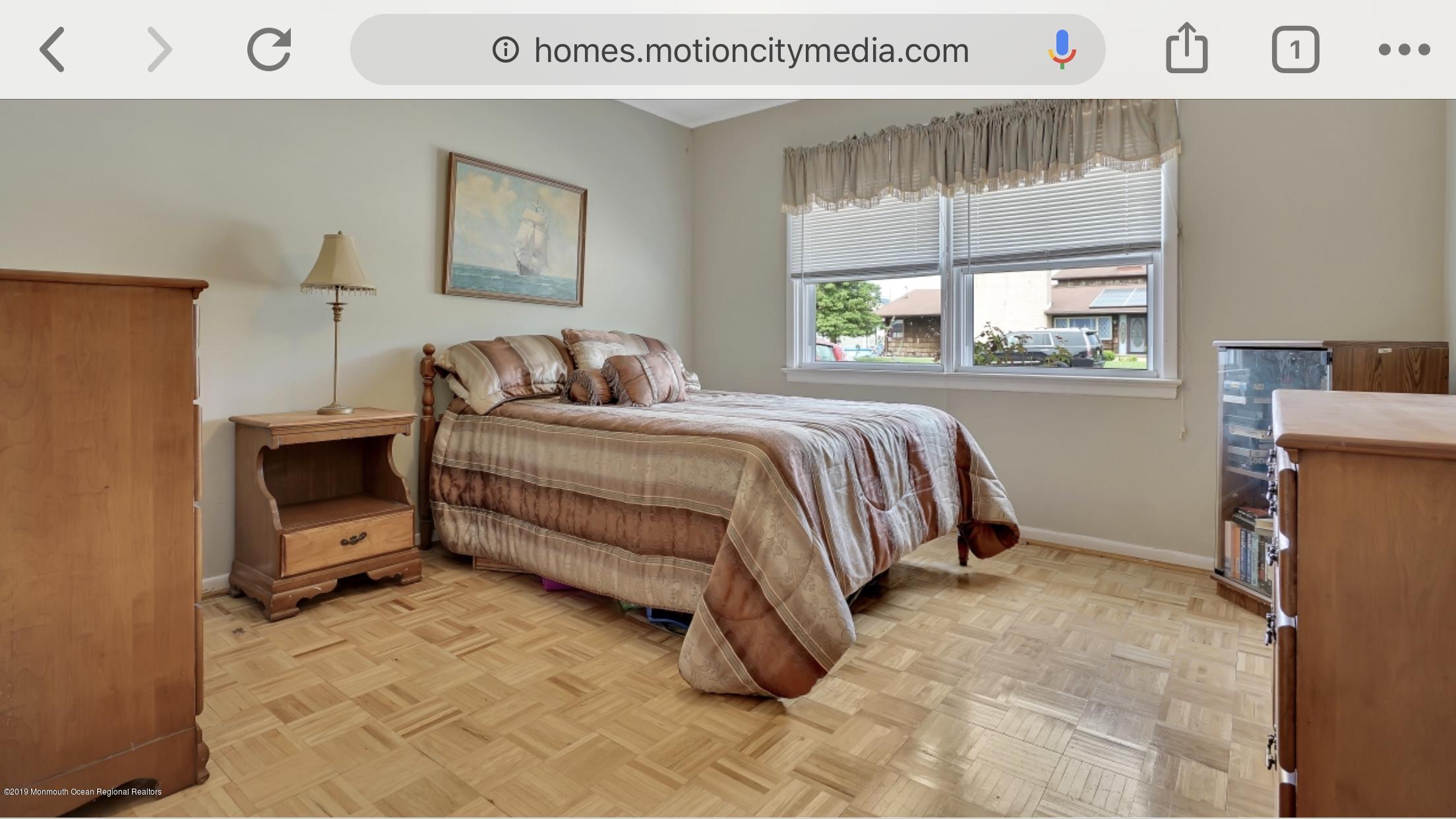 40 Cedar Run Road Bayville, NJ 08721 - Photo 8 of 12 a bedroom with a bed and a window