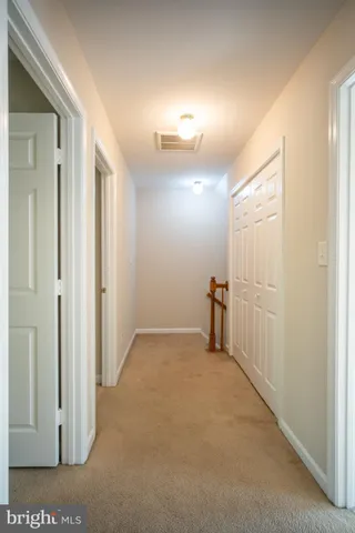 a view of a room with a large window