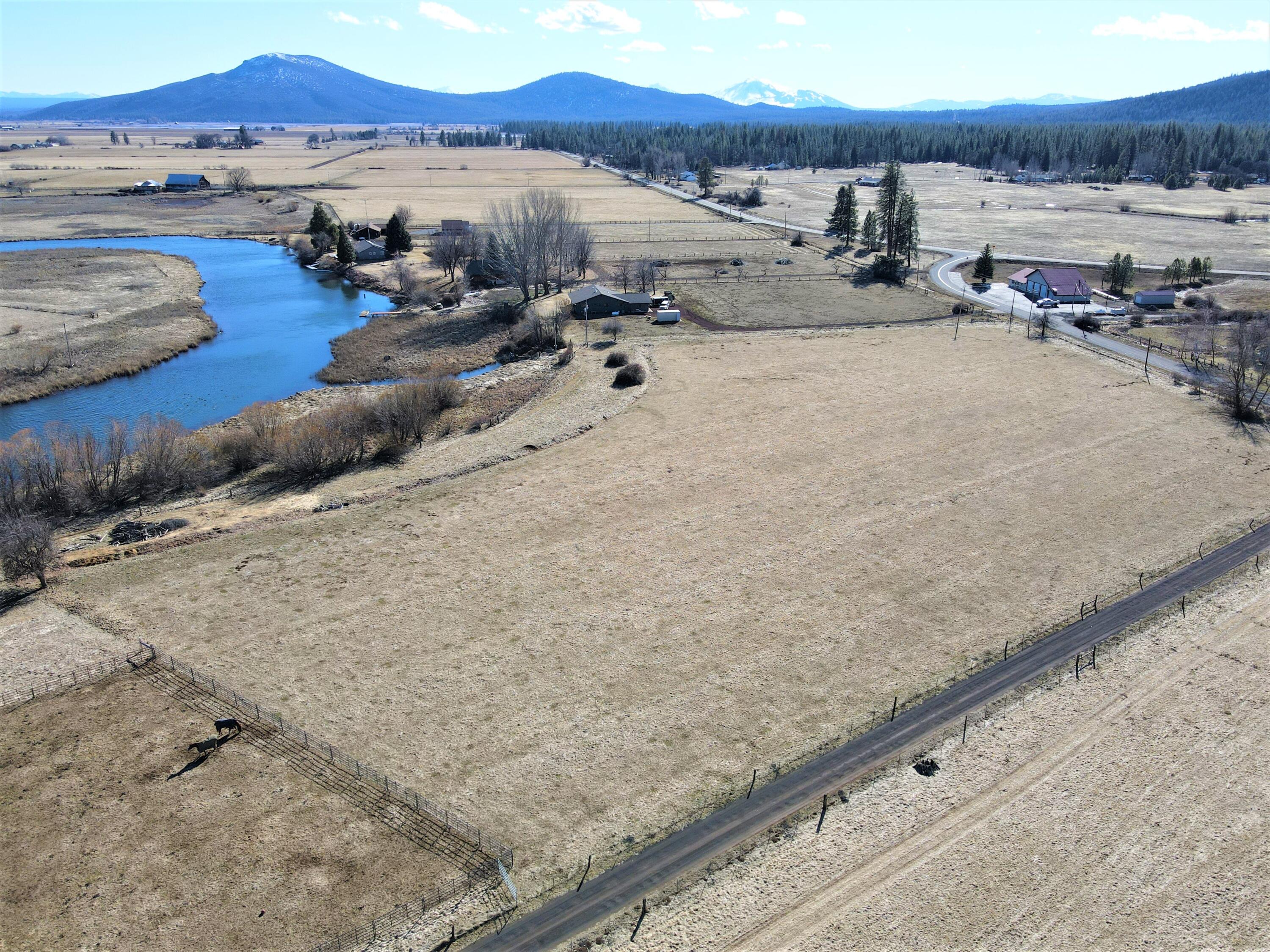 0 Spring Creek Road Fall River Mills, CA 96028 - Photo 14 of 18 a view of a lake with houses