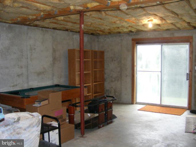 114 Steps To Heaven Road Linden, VA 22642 - Photo 18 of 21 Large Unfinished area to personalize