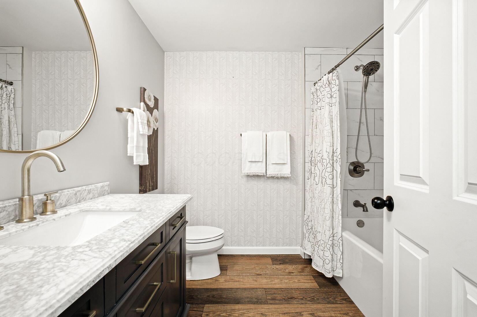 3216 Polley Road Columbus, OH 43221 - Photo 31 of 45 Freshly updated bathroom with large vanity and tub/shower combination.
