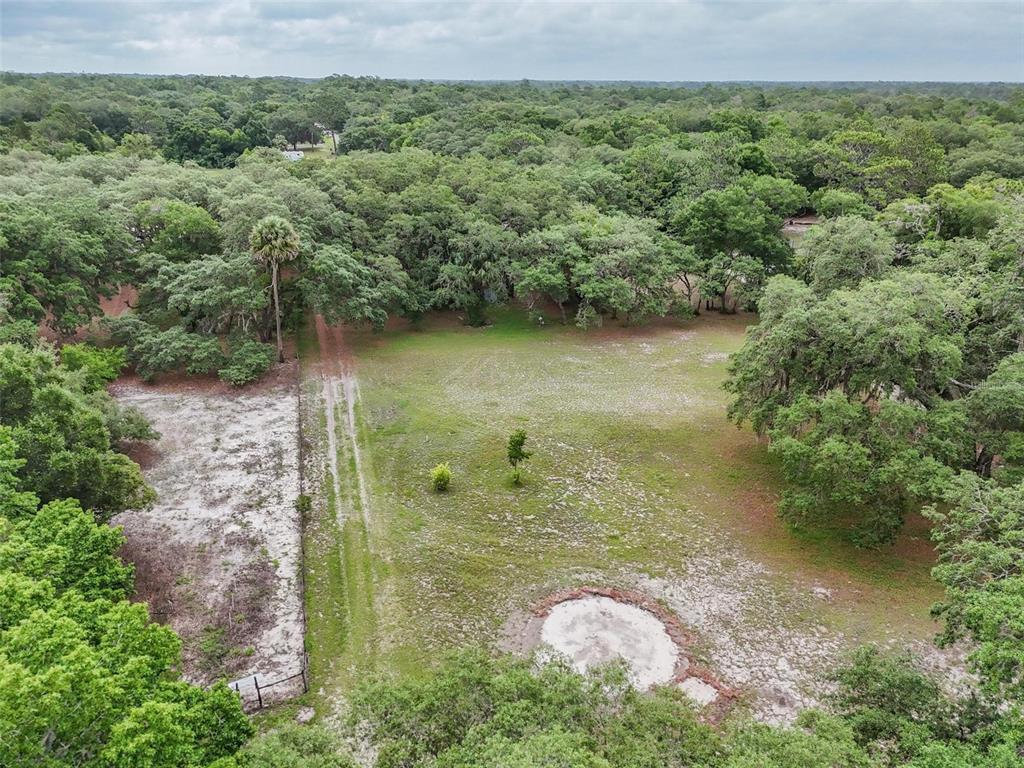 156 Kingfish Road Pomona Park, FL 32181 - Photo 47 of 55 a view of a lake with a yard