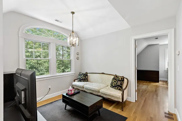 a bedroom with a bed and cabinets